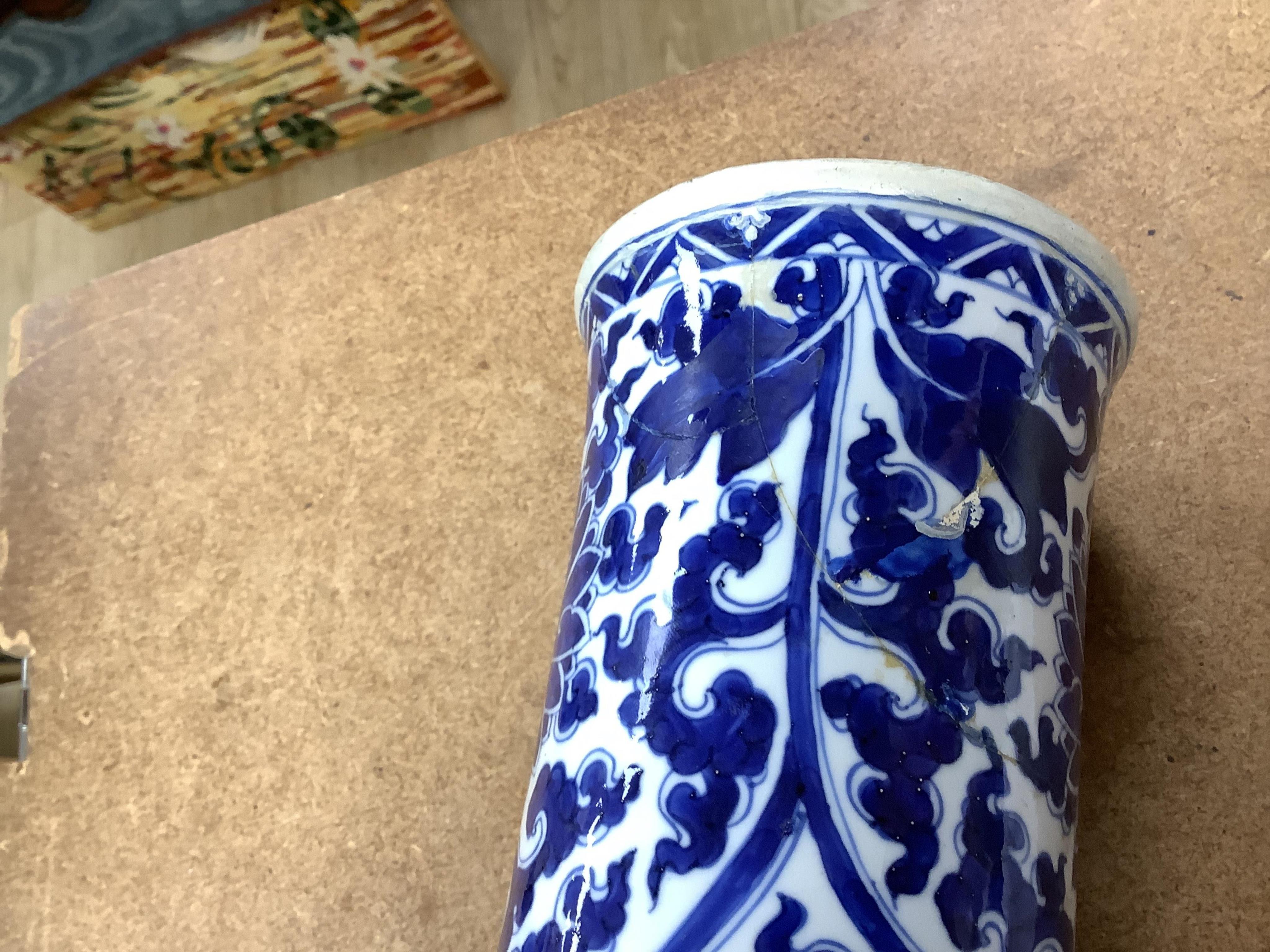 A Chinese blue and white bottle vase with lotus decoration, restored, Kangxi Period, 44cm high